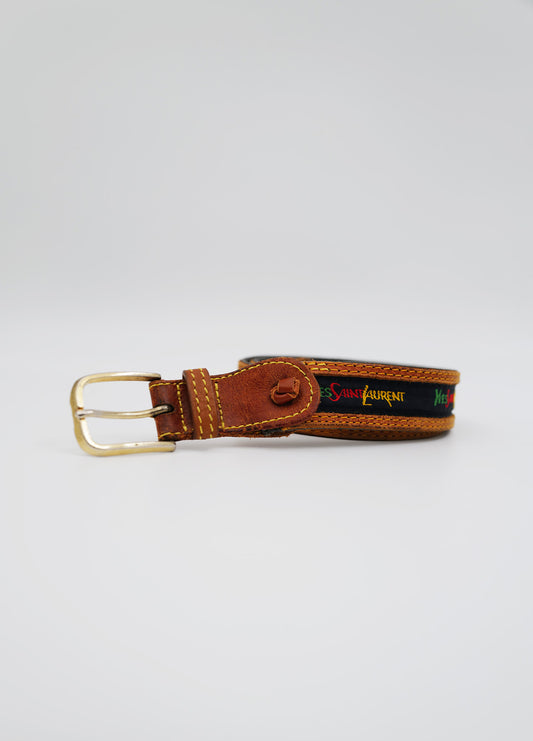 Petite ceinture vintage yves saint laurent brune avec boucle dorée et logo vert rouge jaune sur le long de la ceinture